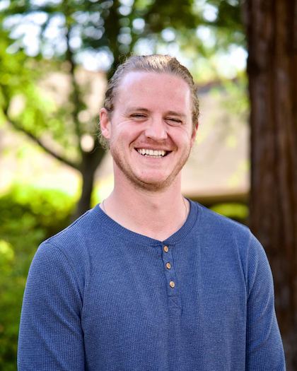 Keegan Davis, staff member male smiling